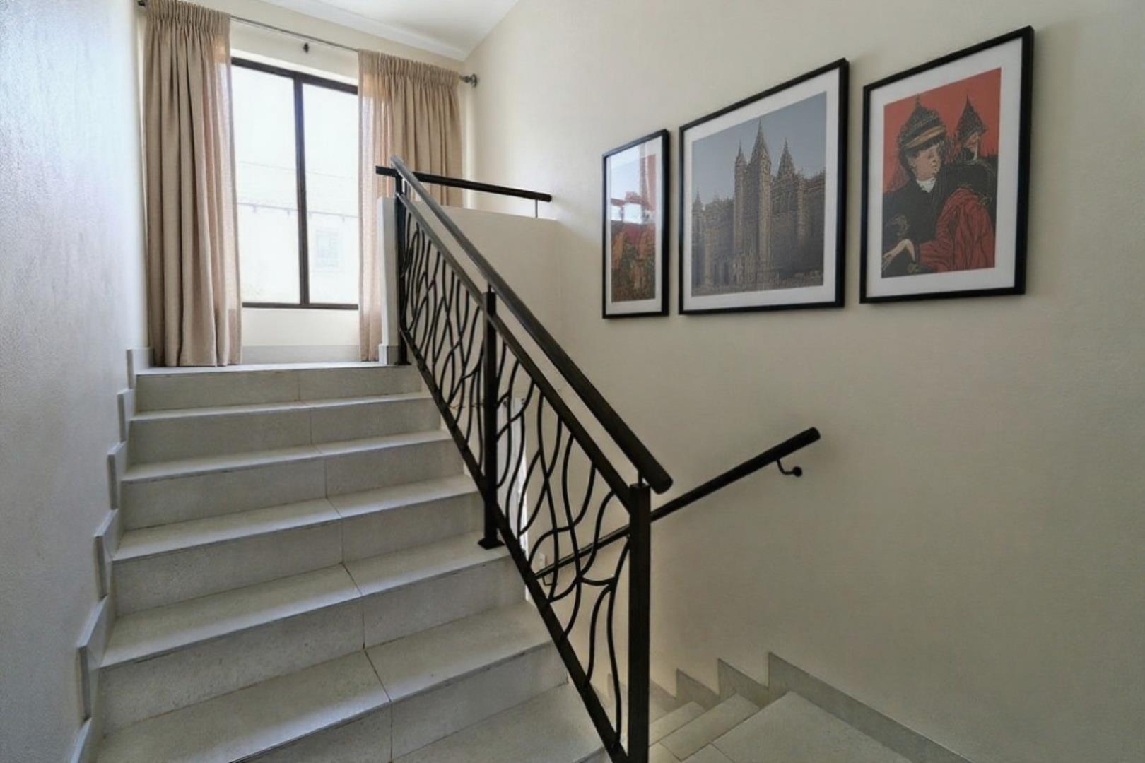 754953_Stairs_with_curtains_and_pics_no_wter_mark.jpeg