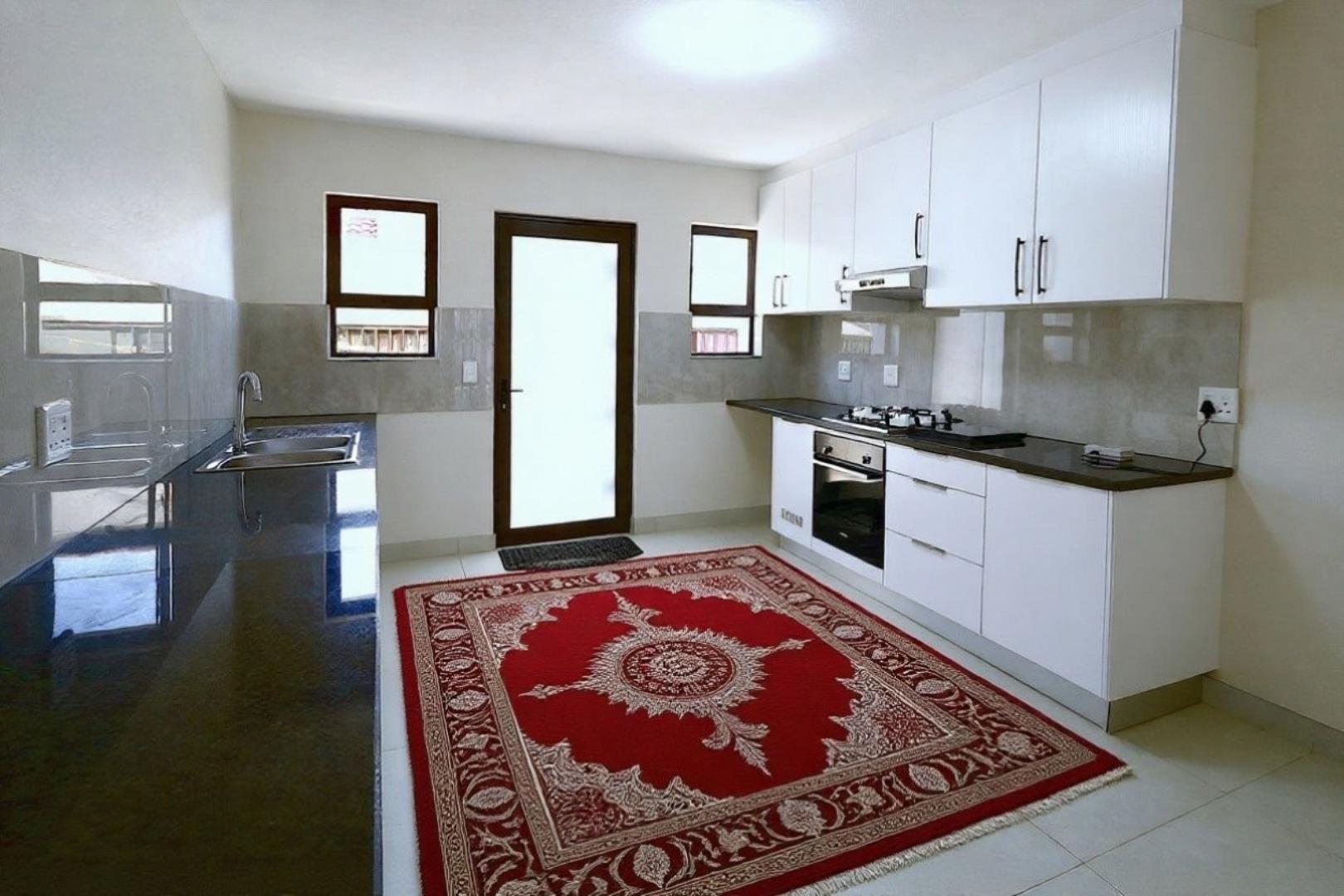 754953_kitchen_with_carpet_no_water_mark.jpeg